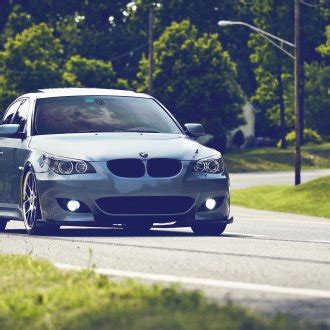 Menacing Silver BMW 5 Series Wearing Custom Vossen Multispoke Wheels