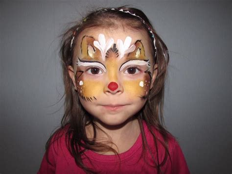 Christmas reindeer face paint by radiant faces artistry face painting