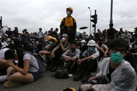 Thousands Of Protesters Paralyze Hong Kongs Financial Hub Over