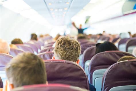 Passengers Inside Airplane Stock Photo Image Of Seat 135637304