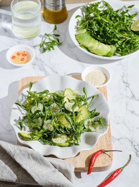 Premium Photo Green Salad With Cucumber And Avocado