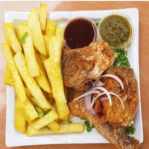 Fried Yam With Fried Fish And Black And Green Sauce