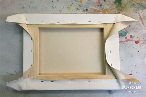 An Empty Wooden Frame Sitting On Top Of A Table