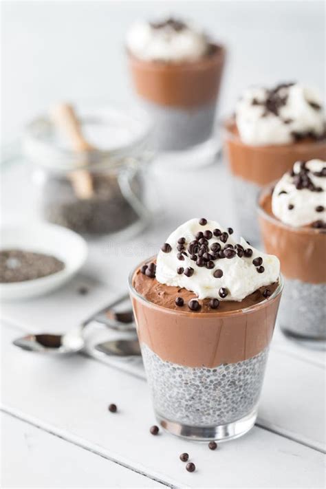 Chocolate Mousse Chia Puddings With Chia Seeds In Behind Ready For