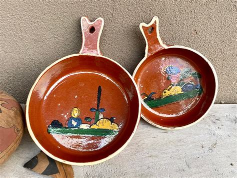 Two Tlaquepaque Tonala Nesting Bowls With Handles Wall Hangings