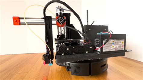 Someone Fused A 3d Printer And A Vacuum Robot To Create A Mobile 3d Printer That Can Print On