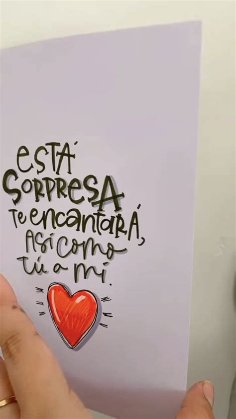 Someone Holding Up A Piece Of Paper With The Words Est Compressa Te