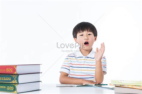 Children Raise Their Hands On Desks Picture And HD Photos | Free Download On Lovepik