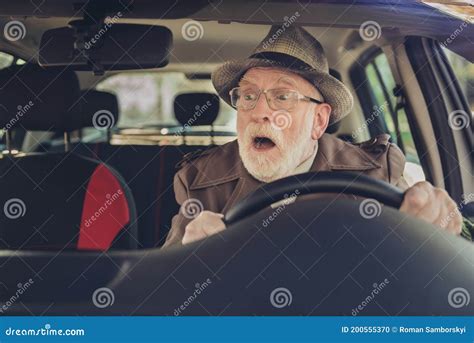 Photo Of Retired Old Man Surprised Face Open Mouth Drive Wear Brown