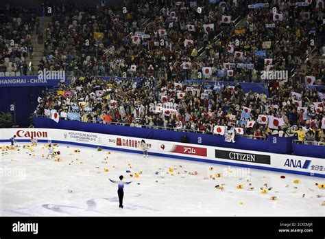 Fans Cheer As Yuzuru Hanyu Of Japan Competes In The Men Short Program