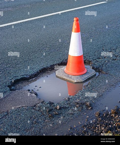 Big potholes on road hi-res stock photography and images - Alamy