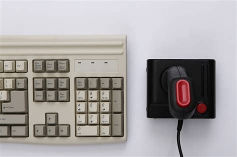 Premium Photo Old Keyboard And Joystick On White Background Retro