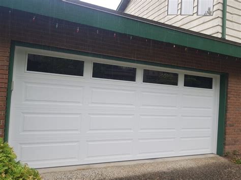 Installed Window Inserts On Insulated Steel Garage Door In Delta