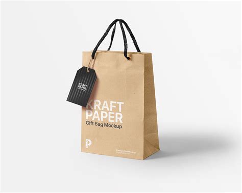 Perspective View Of Kraft Paper Gift Bag And Label Tag Mockup Free