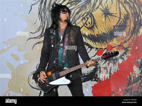 Guitarist Nikki Sixx of Sixx A.M. performing on the opening night of ...