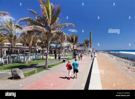 Promenade And Lighthouse Faro De Maspalomas Maspalomas Gran Stock