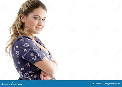 Side View Of Smiling Young Girl With Crossed Arms Stock Photography