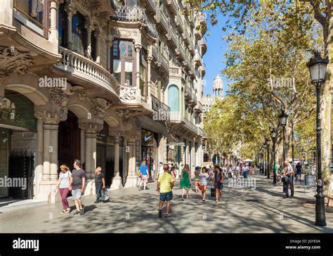 Barcelona Catalunya Spain Tourists Walking Along The Tree Lined Passeig