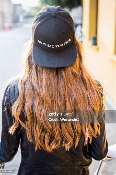 Girls Wearing Baseball Caps Backwards