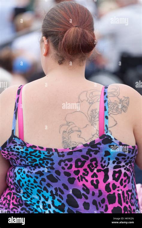 Obese Woman With Tattoo On Her Shoulder Stock Photo Alamy