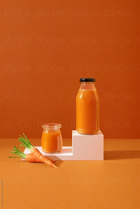 "Fresh Organic Carrot Juice" by Stocksy Contributor "Marc Tran" - Stocksy