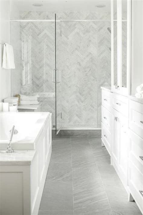 White Bathroom With Porcelain Bathroom Floor In Dark Grey With Chevron