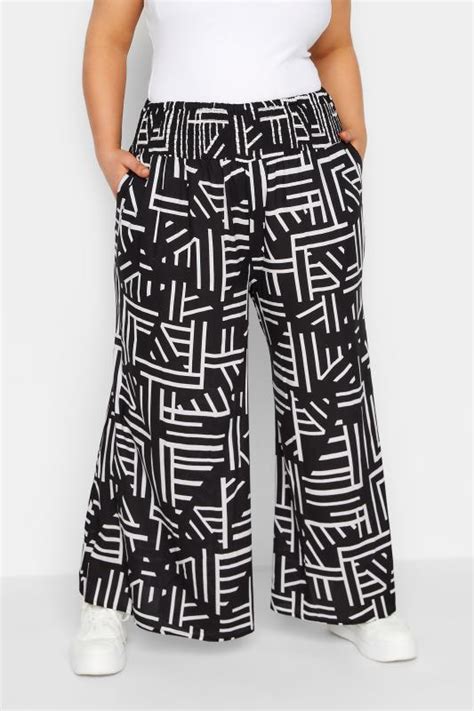 Yours Plus Size Black Geometric Print Shirred Waist Wide Leg Trousers Yours Clothing