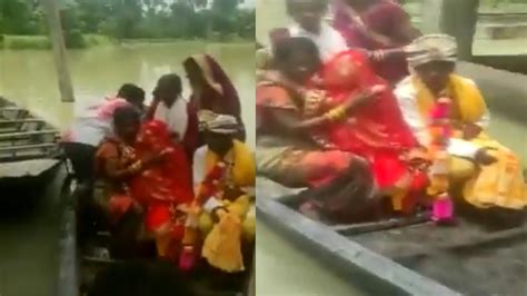 Unique Wedding Video घोड़ी नहीं बल्कि नाव पर बारात लेकर पहुंचा दूल्हा दुल्हन भी नाव में बैठकर