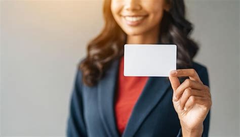 Womans Hand Holding White Business Card Isolated On White Background