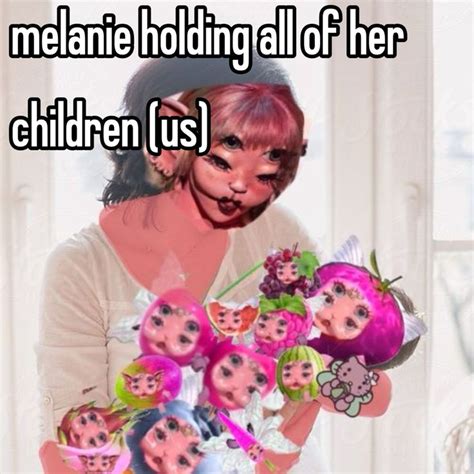 A Woman Holding A Bunch Of Dolls With The Caption Meanie Holding All Of