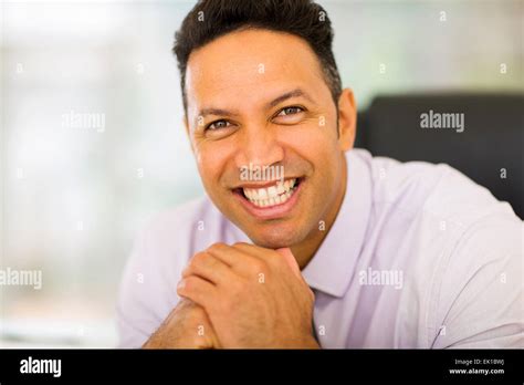 Smiling Businessman Looking At The Camera Stock Photo Alamy