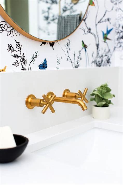 Aged Brass Cross Handle Faucet On Sink Vanity Quartz Backsplash Transitional Bathroom