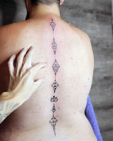 Stunning Spine Tattoos For Men To Inspire And Empower