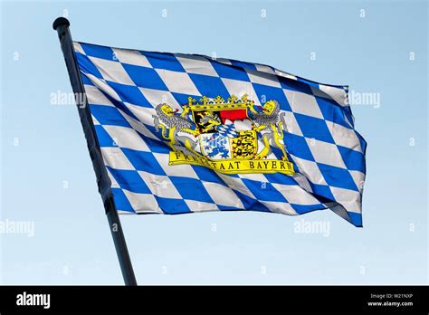 A Blue White Flag With The Coat Of Arms Of The Free State Of Bavaria