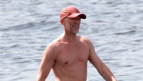 Vincent Cassel Goes Paddleboarding During Beach Day With Wife Tina