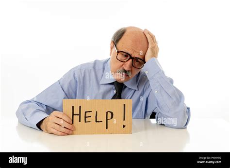 Senior Mature Business Man With Bald Head On His 60s Feeling Stressed