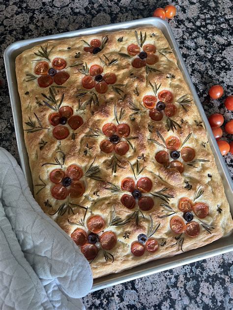 Focaccia With Cherry Tomatoes Olives Rosemary And Fresh Oregano In