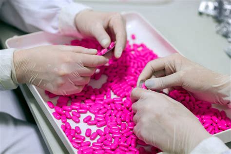 Pill Manufacturing Stock Photos Pictures And Royalty Free Images Istock