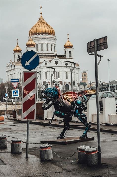 Dinosaur Metal Sculpture On The Street · Free Stock Photo