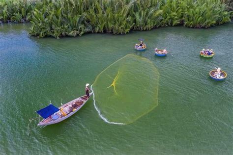 From Hoi An Market Tour Basket Boat Ride And Cooking Class Getyourguide