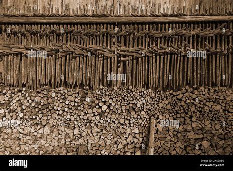 Stacked Firewood And Hanging Hay Hay Dryer At A Barn Bad Oberdorf