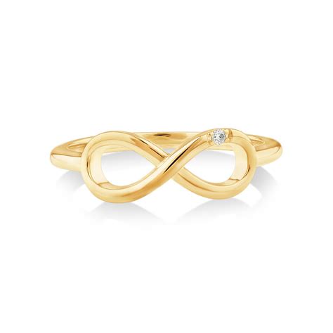 Diamond Accent Infinity Ring In 10kt Yellow Gold