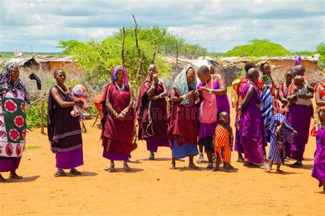 Women From The African Tribe Maasai In National Dress In Their Village