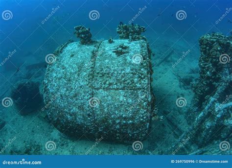 Scuba Diver Exploring Of Sunken Shipwreck In Cortez Sea Stock Photo