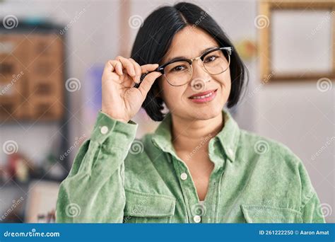 Young Chinese Woman Artist Smiling Confident Standing At Art Studio