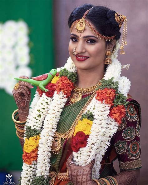 A Woman In A Red And Gold Outfit