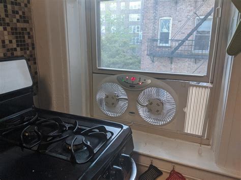 13 Best Window Fans For Keeping Things Nice And Breezy