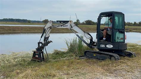 Bobcat E35 Mowing Pond Bank W Rut Mfg Cutter YouTube