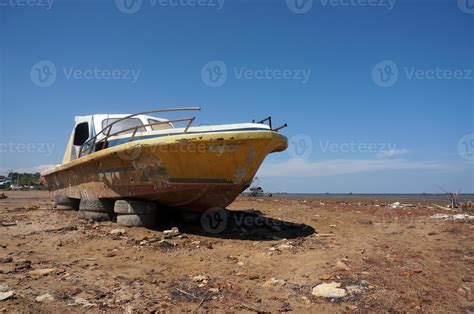 Old Abandoned Wrecked Speed Boat At Ship Or Boat Graveyard Lots Of