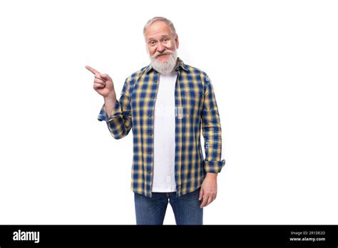 Mature Gray Haired Retired Man With A Mustache And Beard Shows A Hand